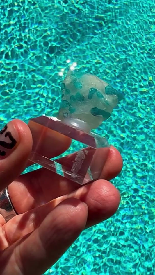 Poolside and glowing like neon