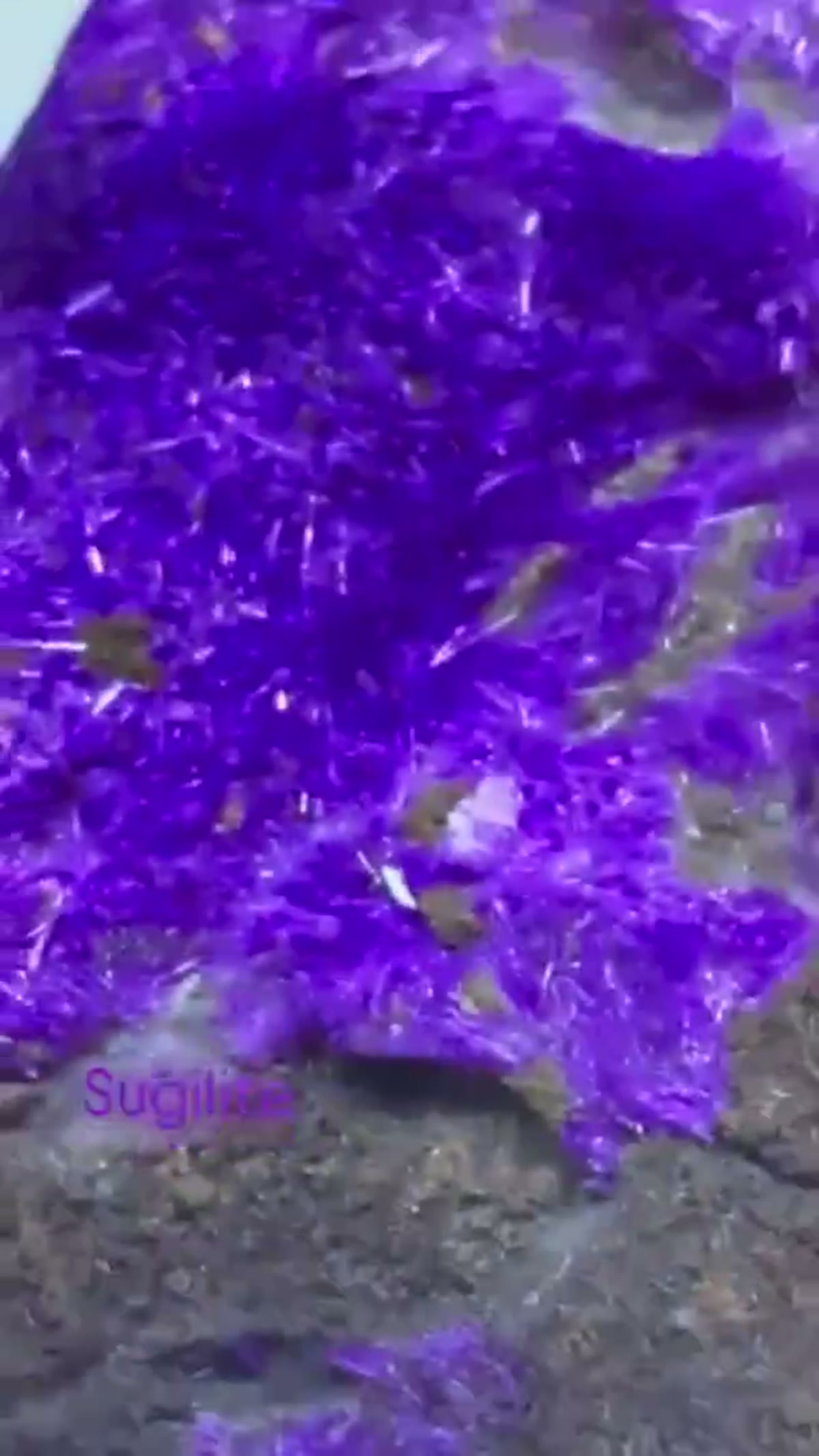 Mineral Specimen: Sugilite is a purple, pink, or occasionally colorless - view 4