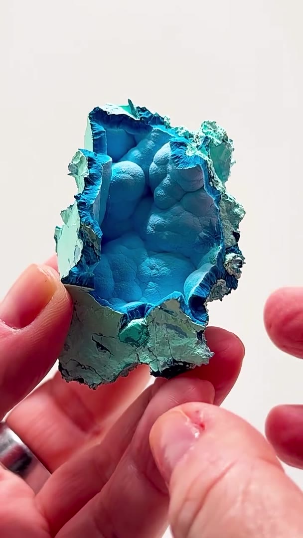 CLOUDS OF SHATTUCKITE