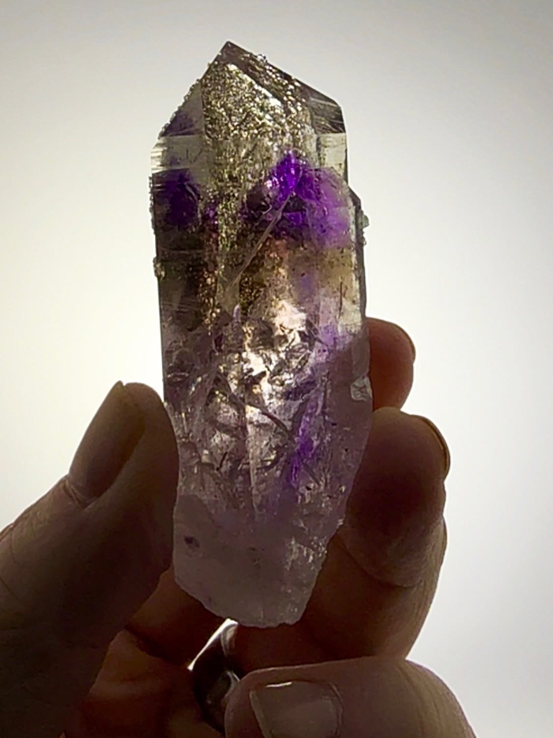 A CRYSTAL THAT LOOKS LIKE IT WAS DUSTED BY WINTER