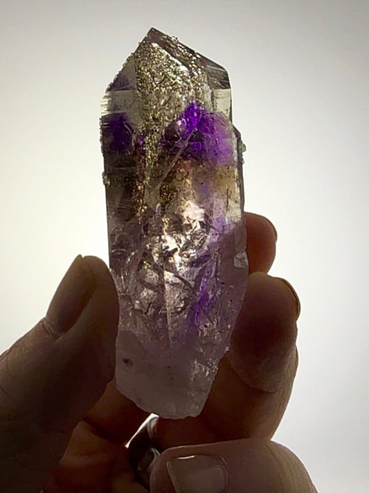 A CRYSTAL THAT LOOKS LIKE IT WAS DUSTED BY WINTER