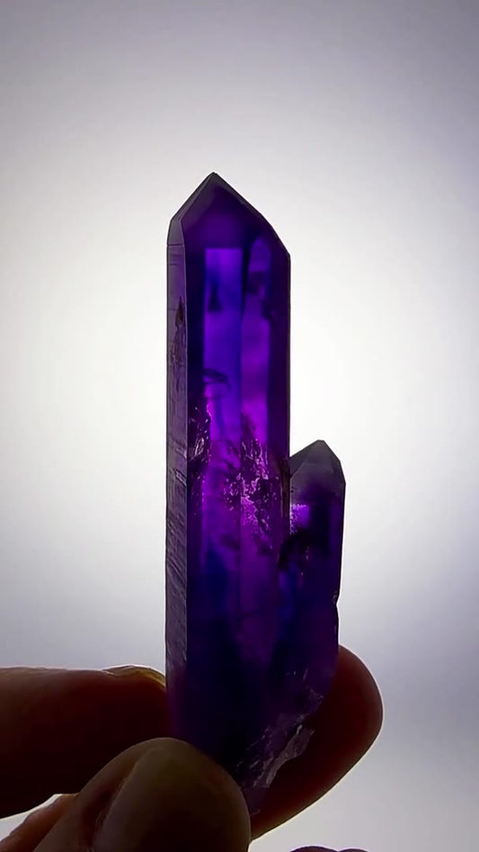 A PERFECT PAIR OF PURPLE FIRE
