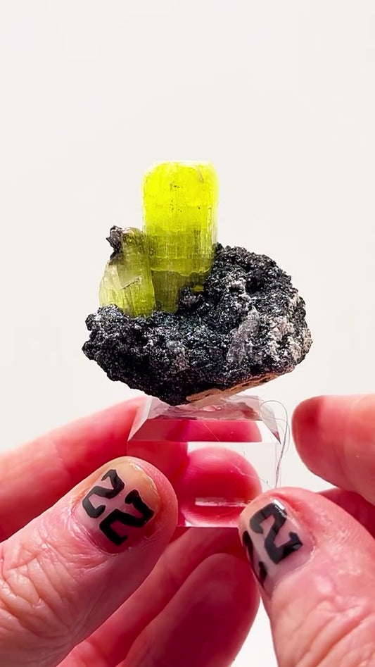 ETTRINGITE ON HEMATITE — SOUTH AFRICAN FIRE