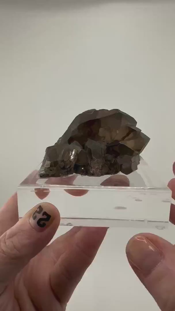 Discover the breathtaking beauty of Smoky Quartz Gwindel Cluster from…