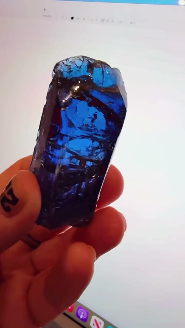 WOAH!  Some crystals demand your attention… this insanely pleochroic…