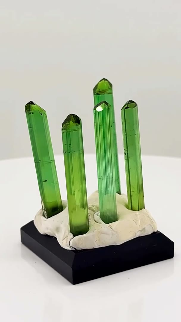 Five gem-green Congo pencil tourmalines lined up like nature’s finest brush…