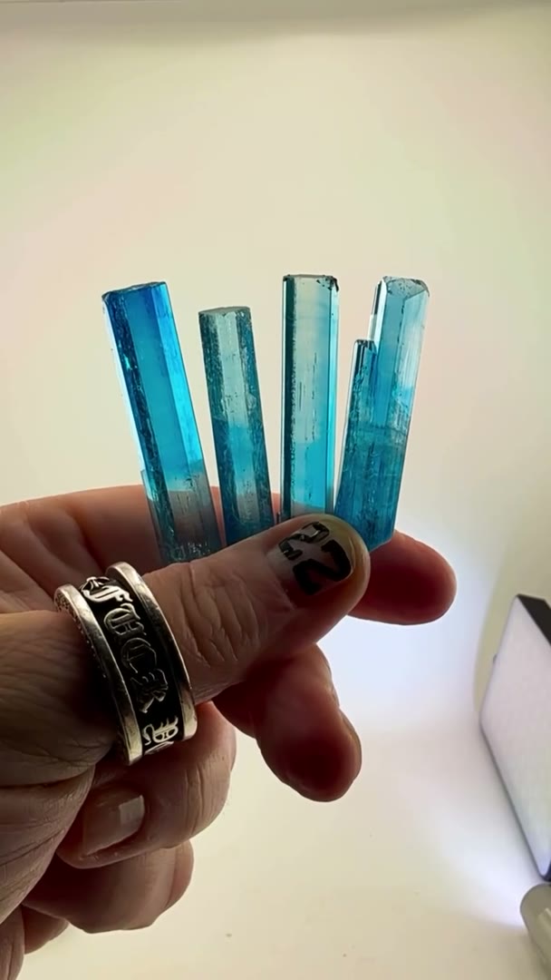 4 absolute GEM Vietnamese aquamarines in hand